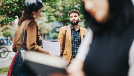 Business professionals engaged outside