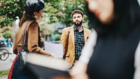 Business professionals engaged outside