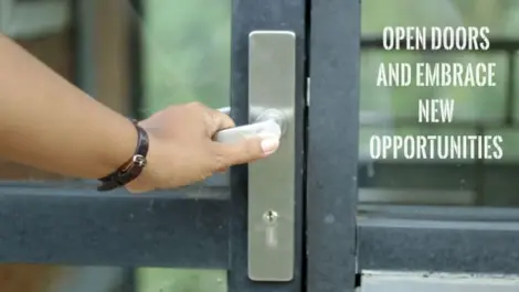 A hand opening the front door handle at {{location_name}}