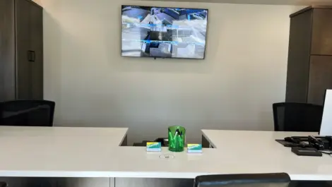 Office area, plus security tv on wall at Towne Storage Clearfield