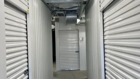 Indoor storage unit hallway at the Towne Storage Redwood Storage Facility