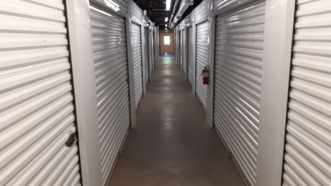 Interior storage units with roll up doors at the Towne Storage Union Park Storage Facility