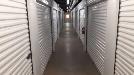 Interior storage units with roll up doors at the Towne Storage Union Park Storage Facility
