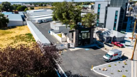 Drone view of entrance to Towne Storage Clearfield, plus U-Haul truck