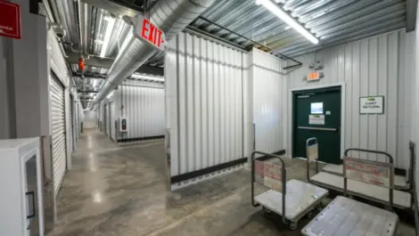 Side door entry with dollies for moving belongings at Towne Storage-Clinton