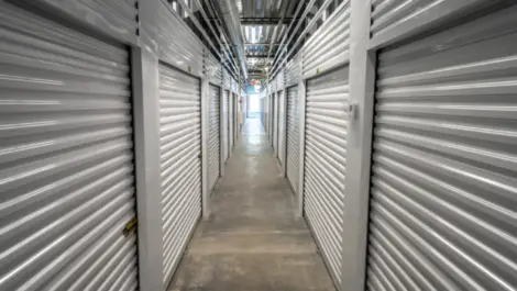 Clean, hallway of storage units at Towne Storage-Clinton