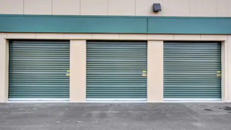 Three storage units, outdoor, drive up access, green doors Towne Storage Deer Springs