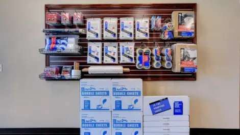 Wall of storage and moving supplies Towne Storage Sunset