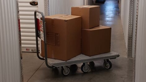 Loading dolley with cardboard boxes at the Towne Storage Union Park Storage Facility