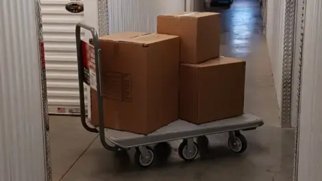 Loading dolley with cardboard boxes at the Towne Storage Union Park Storage Facility