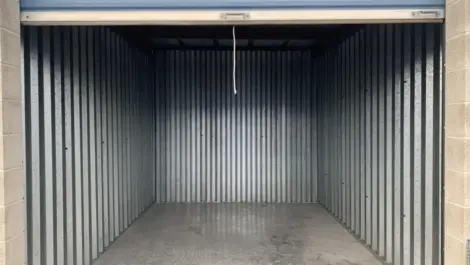 Storage unit with a rolled up door at the Towne Storage West Valley Storage Facility