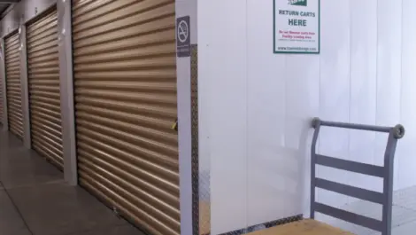 Inside storage facility with dolly at Towne Storage - Daniels Rd.