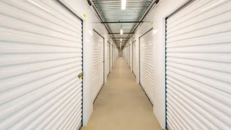 Hallway of white storage units Towne Storage Broadway