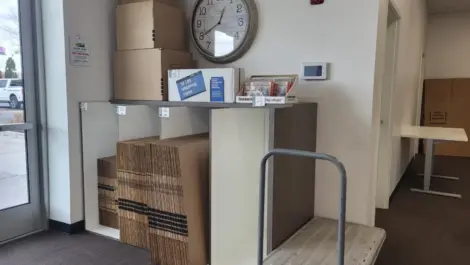Boxes for sale and a moving dolley at the Towne Storage Urban Edge Storage Facility